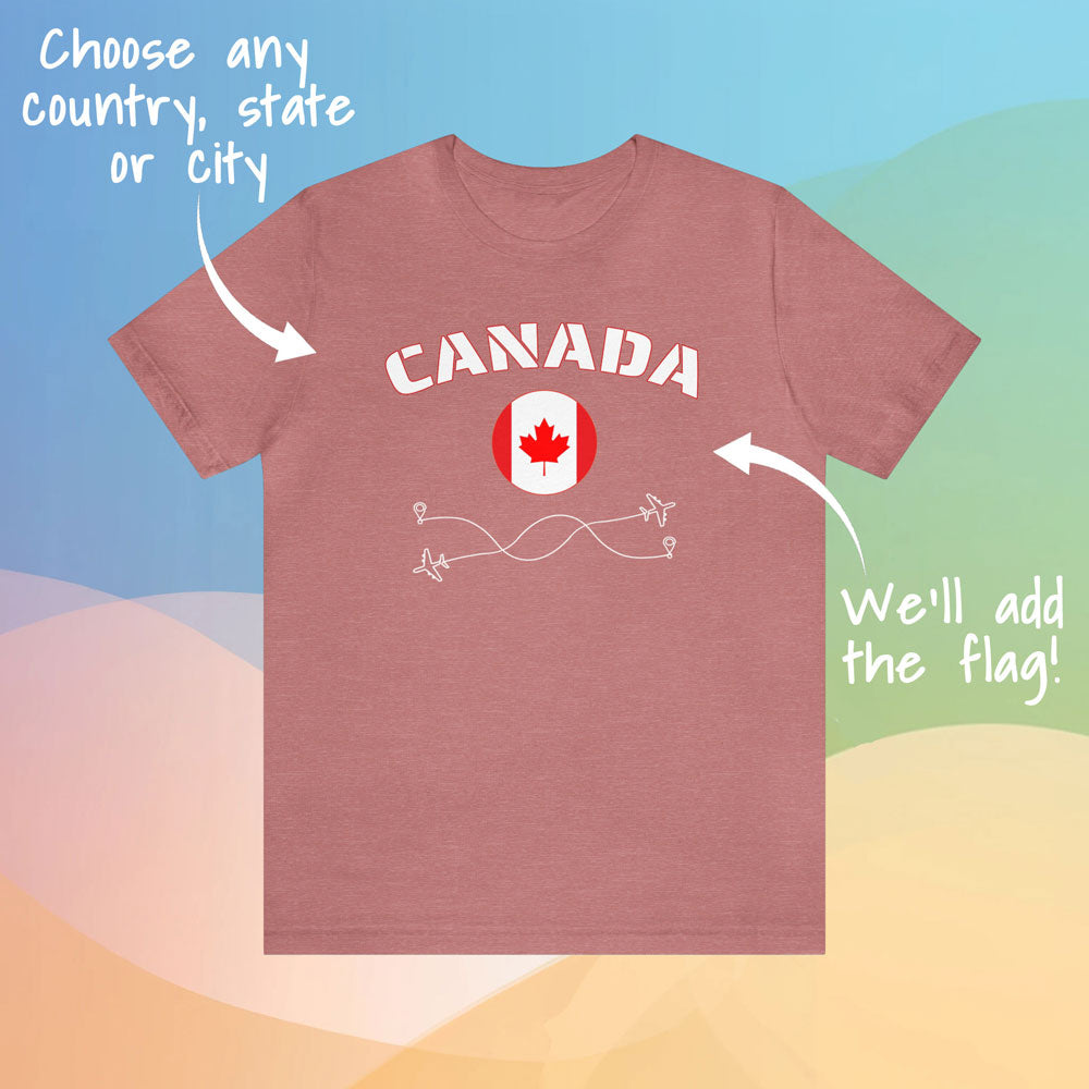 Cotton T-shirt in the color Mauve featuring the word 'Canada' and its rounded flag, in a colorful background