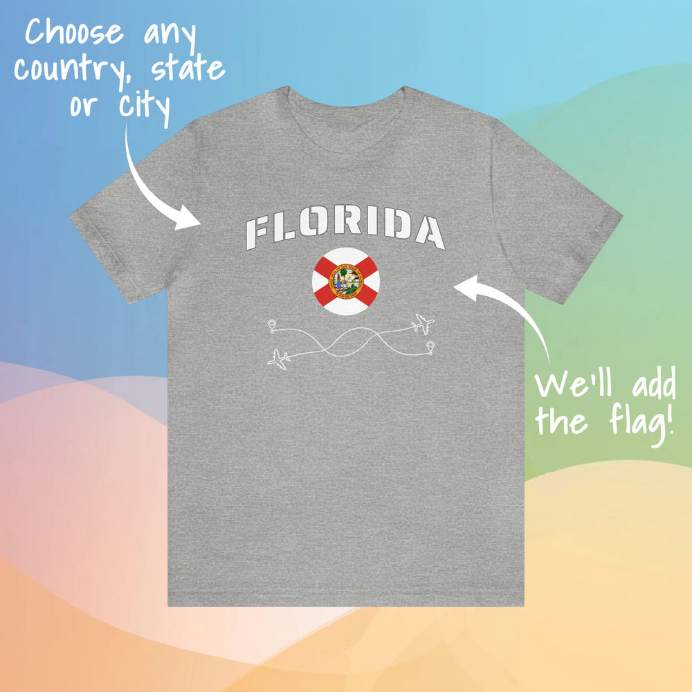Gray cotton T-shirt featuring the word 'Florida' and its rounded flag, in a colorful background