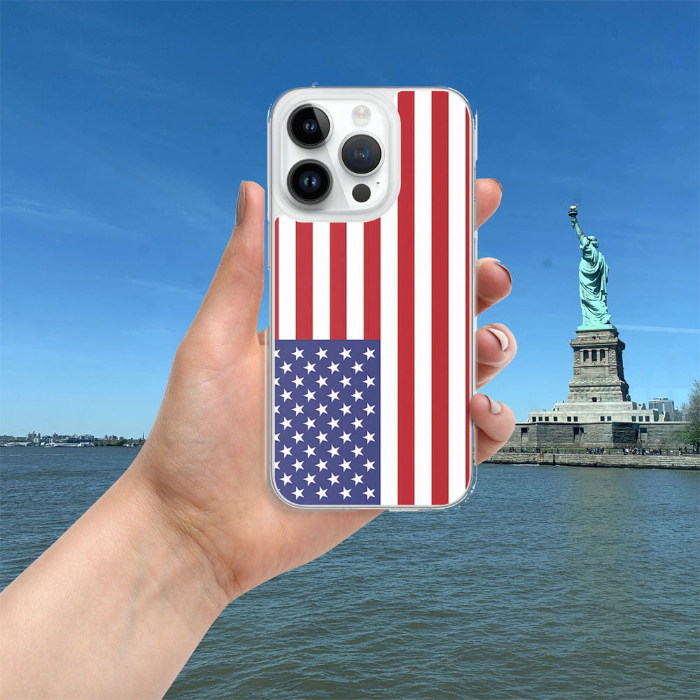 iphone with a case featuring the United States flag in new york with the statue of liberty on the backgrounda