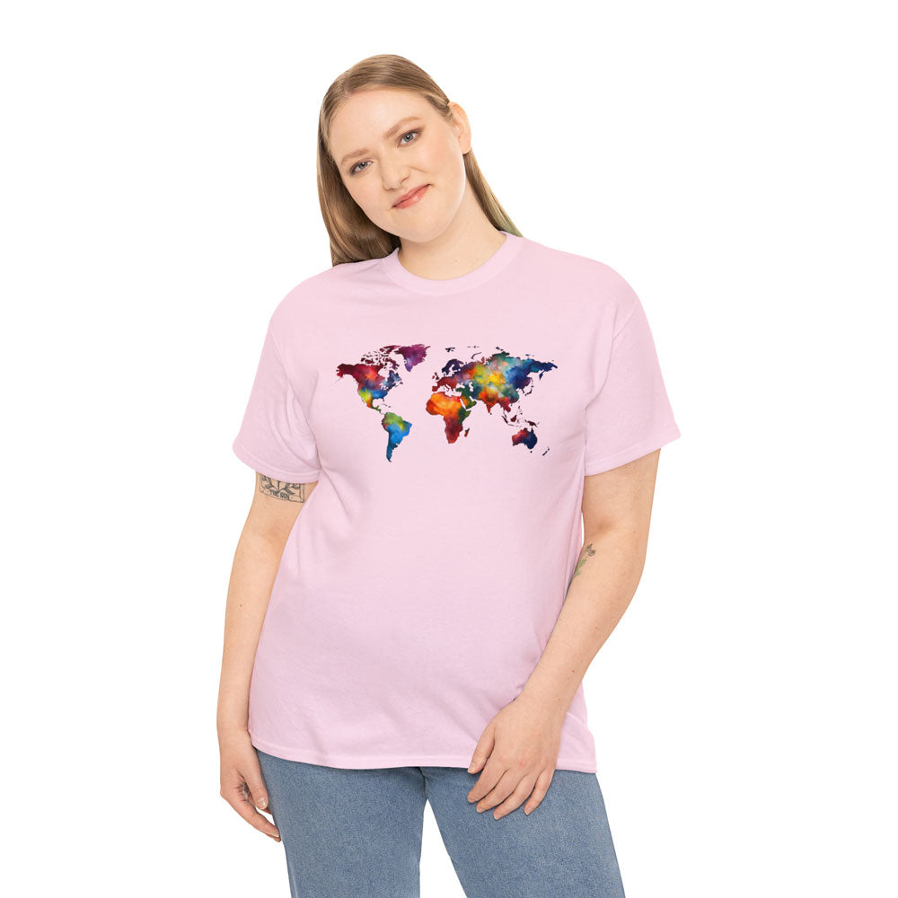 Young white lady wearing a light pink t-shirt featuring a multicolored world map graphic and jeans pants