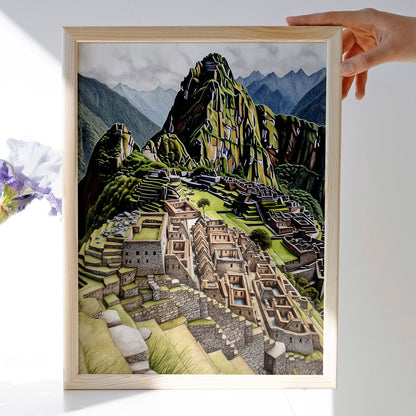 Wood-framed Machu Picchu poster held by a feminine hand against a white wall with natural light