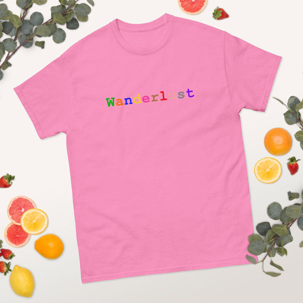 Pink cotton t-shirt adorned with the word 'Wanderlust', set against a white backdrop with a charming arrangement of fruits and lush greenery