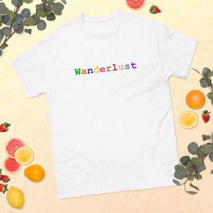 White cotton t-shirt adorned with the word 'Wanderlust', set against a backdrop of soft yellow with a charming arrangement of fruits and lush greenery